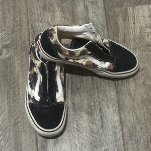Vans cow print shoes